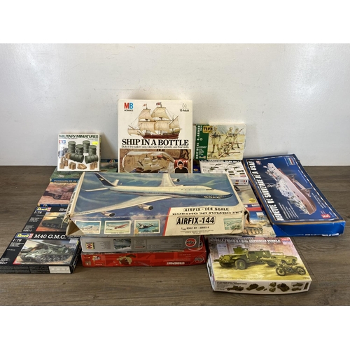 428 - A large collection of model kits to include Airfix Hawker Hurricane Mk1, MB Hobbies ship in a bottle... 