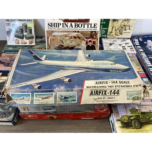 428 - A large collection of model kits to include Airfix Hawker Hurricane Mk1, MB Hobbies ship in a bottle... 