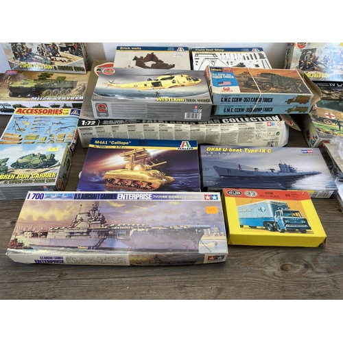 429 - A large collection of model kits to include Airfix RAF Emergency set, Airfix 25PDR Field Gun & Morri... 