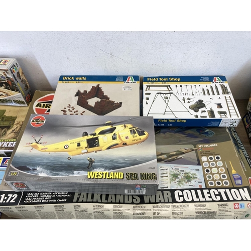 429 - A large collection of model kits to include Airfix RAF Emergency set, Airfix 25PDR Field Gun & Morri... 