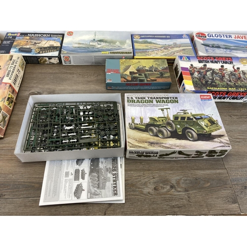 433 - A collection of model kits to include Airfix, Italeri, Hasegawa, Academy, Tamiya, Revell etc.