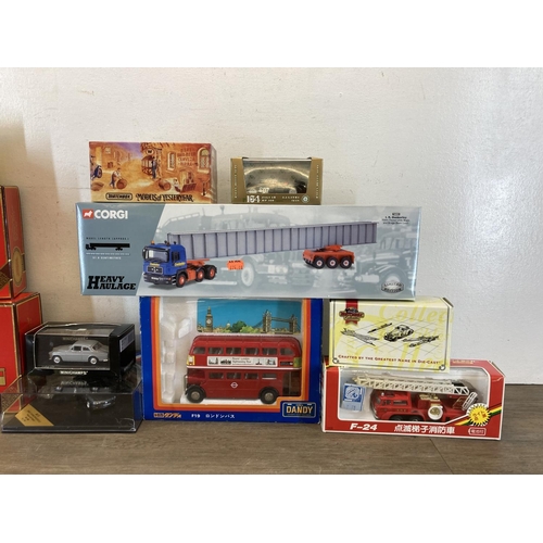 439 - A collection of boxed diecast model vehicles to include Corgi Heavy Haulage Limited Edition I.R. Dun... 