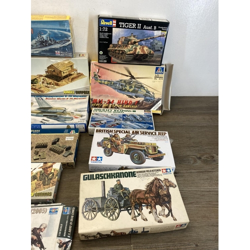 443 - A large collection of model kits to include Airfix, Revell, Hasegawa, Italeri, ESCI, Eastern Express... 