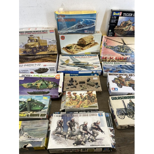 443 - A large collection of model kits to include Airfix, Revell, Hasegawa, Italeri, ESCI, Eastern Express... 