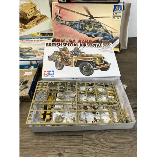 443 - A large collection of model kits to include Airfix, Revell, Hasegawa, Italeri, ESCI, Eastern Express... 