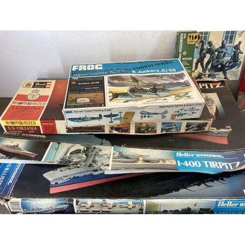 445 - A collection of model kits to include Airfix, Frog, Revell, Heller etc.