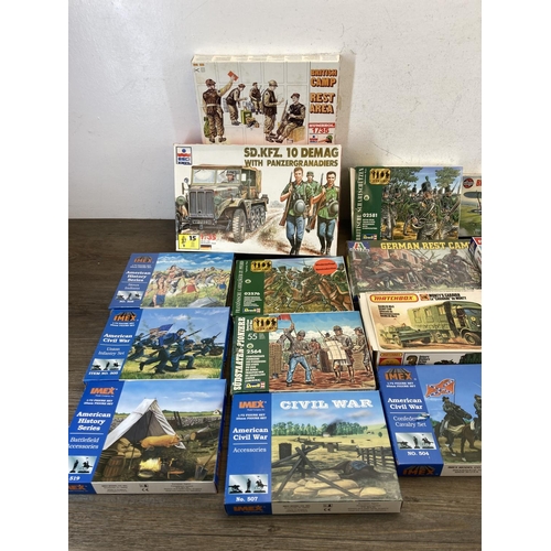 448 - A collection of model kits to include Tamiya, Italeri, Airfix, Revell, Imex, Matchbox etc.