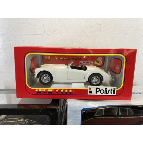 450 - Three boxed diecast model vehicles, AUTOart Performance Jaguar XKR Coupe, Polistil MG A Twin Cam and... 