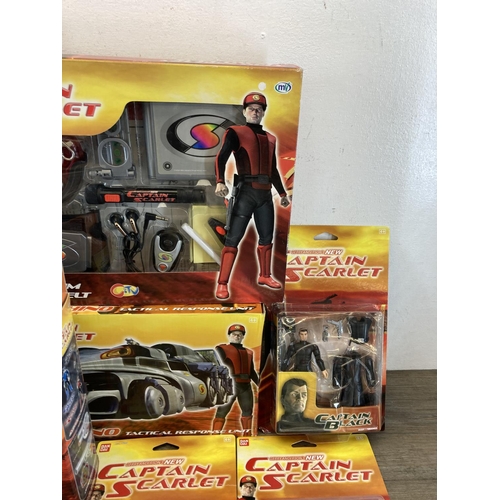 465 - A large collection of Captain Scarlet toys and collector's figurines to include Spectratech Communic... 