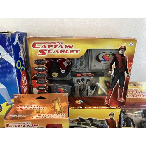 465 - A large collection of Captain Scarlet toys and collector's figurines to include Spectratech Communic... 