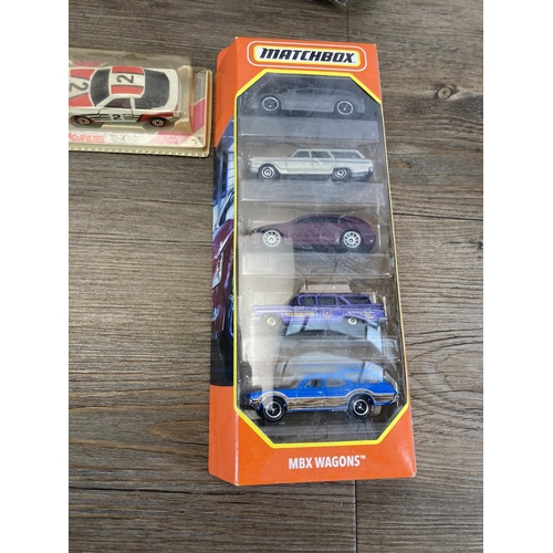 470 - A collection of vintage boxed diecast model vehicles to include Matchbox, Dinky, Mattel, Majorette e... 