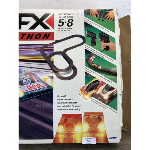 472 - A vintage boxed Tomy AFX Midnight Marathon slot car set