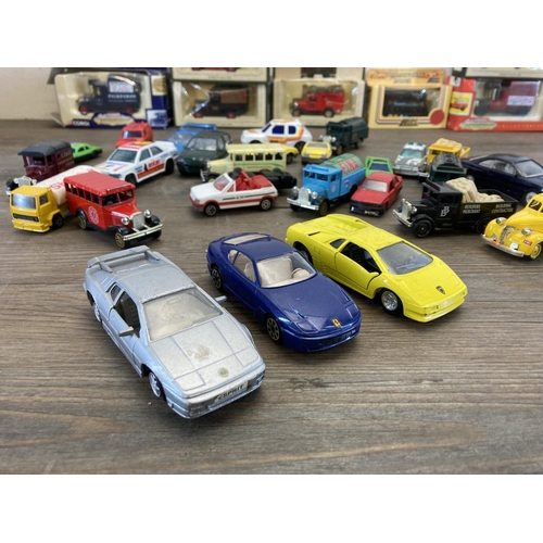 479 - A collection of diecast model vehicles to include Corgi, Lledo, Bburago etc.