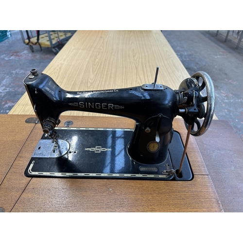 783 - A 1951 Singer 201K treadle sewing machine with accessories and instruction manual - approx. 76cm hig... 