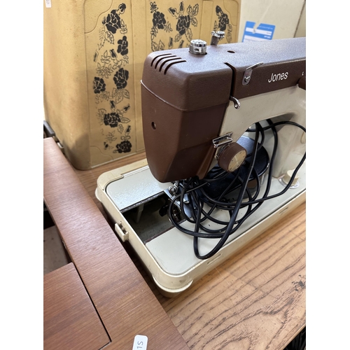 785 - A Jones electric sewing machine with foot pedal