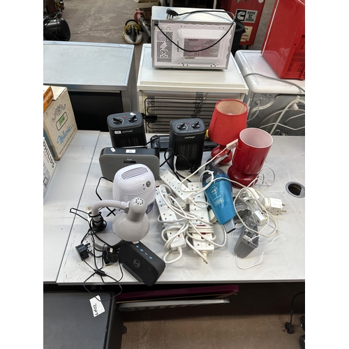 803 - A collection of electrical items to include two Challenge fan heaters, Bush DAB radio, Acoustic Solu... 