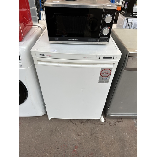 814 - A Bosch Logixx easy access 60cm under counter fridge