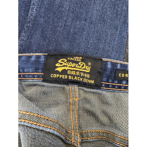 510 - Eight pairs of men's jeans to include Superdry, Next etc.