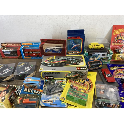 492 - A collection of boxed diecast model vehicles to include Corgi, Bburago, Matchbox, Onyx etc.