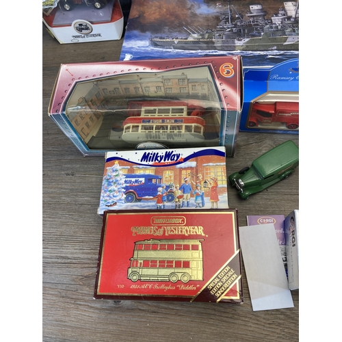 496 - A collection of boxed diecast model vehicles to include Corgi Tramlines, Corgi Collectors' Classics,... 