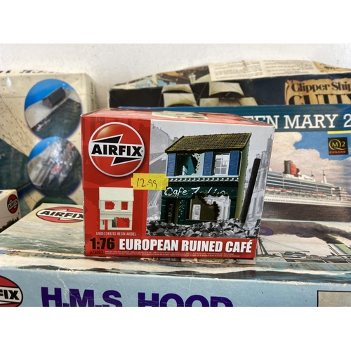 498 - A large collection of model kits to include Airfix, Revell, Heller etc.