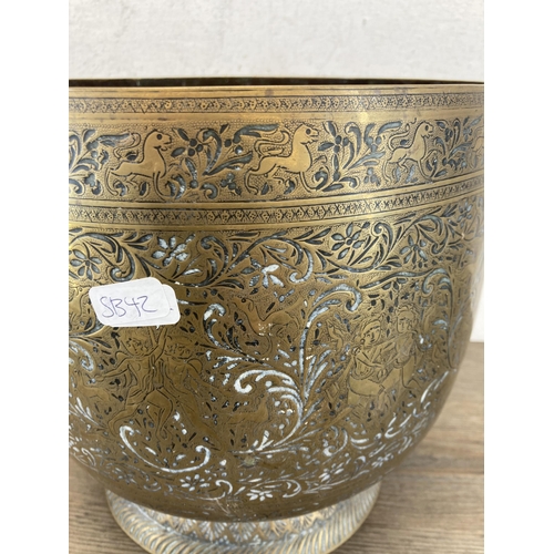 397 - Six pieces of antique and later brassware, one Indian engraved jardinière - approx. 23cm high x 23cm... 