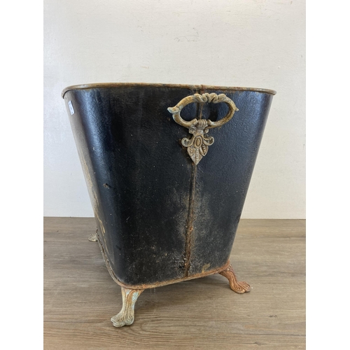 405 - A 19th century style Toleware two handled coal bucket on cast aluminium footed base and hand-painted... 