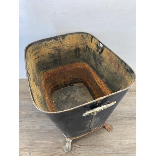 405 - A 19th century style Toleware two handled coal bucket on cast aluminium footed base and hand-painted... 