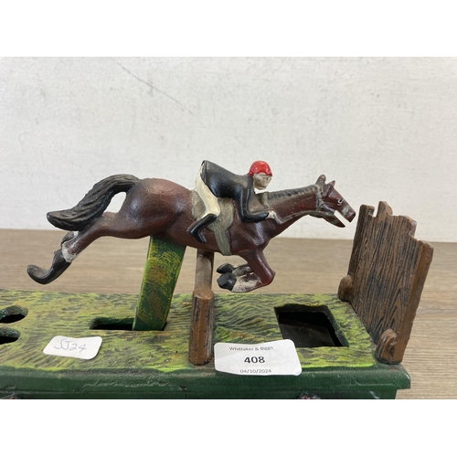 408 - A 19th century style hand-painted cast iron show jumper mechanical coin bank