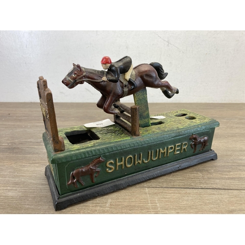 408 - A 19th century style hand-painted cast iron show jumper mechanical coin bank