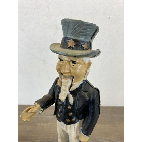 409 - A 19th century style hand-painted cast iron Uncle Sam mechanical money bank