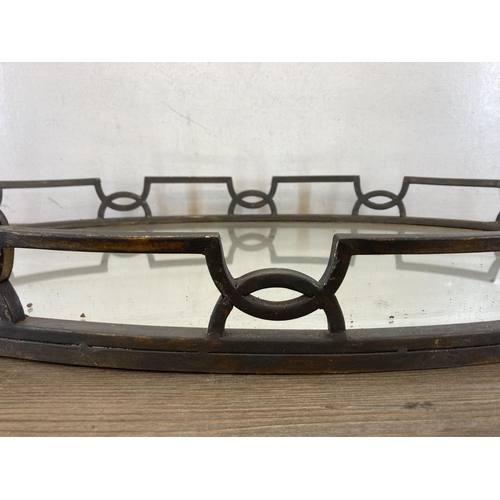 414 - A cast metal and mirrored glass serving tray - approx. 81cm long x 45cm wide