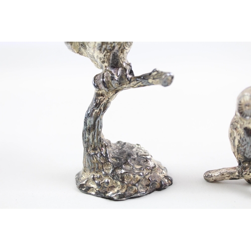 2226 - Two silver plated owl figurines - largest approx. 9cm high