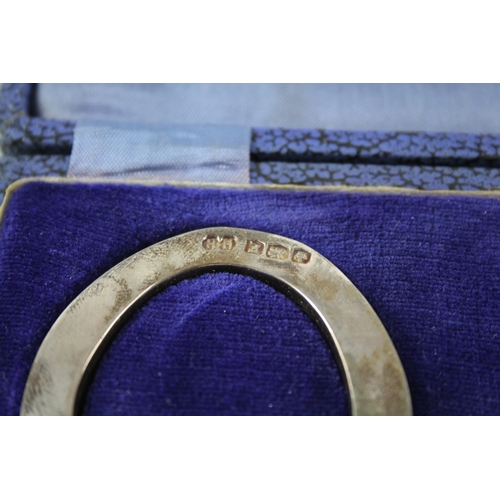 2242 - Two boxed hallmarked Sheffield silver lucky horse shoe ornaments - approx. gross weight 66g