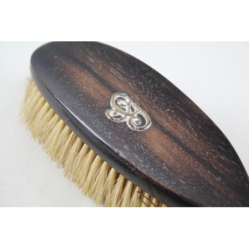 2242A - Five .925 silver overlaid lady's vanity items, one ebony hand mirror, one ebony brush, one leather p... 