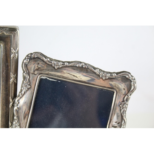 2243 - Three hallmarked sterling silver photograph frames - largest approx. 20cm high x 15cm wide