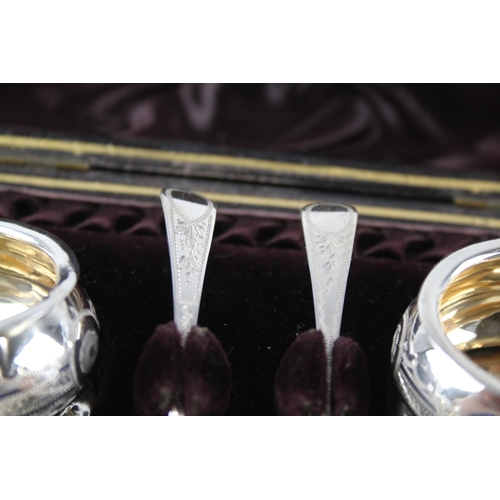 2247 - A pair of Victorian hallmarked Birmingham silver condiment dishes with spoons and fitted case - appr... 