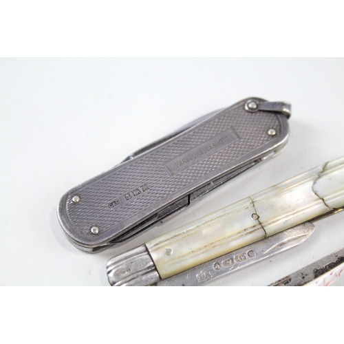 2256 - Four hallmarked sterling silver pocket knives, three mother of pearl handled and one silver handled ... 