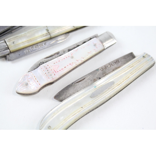 2256 - Four hallmarked sterling silver pocket knives, three mother of pearl handled and one silver handled ... 