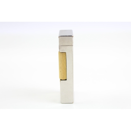 2266 - A boxed Dunhill Rollagas two tone pocket lighter