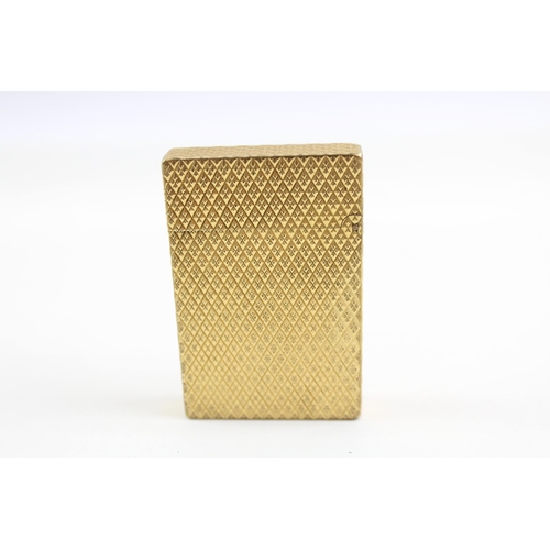 2268 - A St Dupont Paris gold plated and diamond cut hobnail pattern pocket lighter