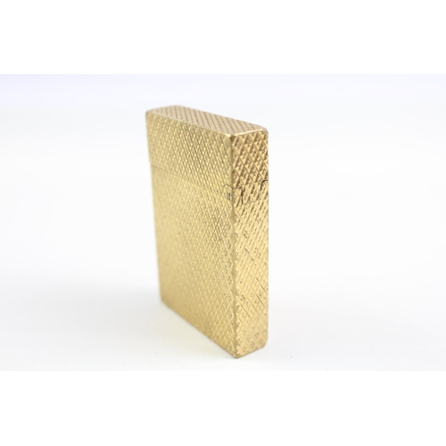 2268 - A St Dupont Paris gold plated and diamond cut hobnail pattern pocket lighter