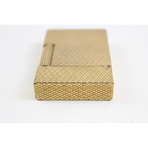 2268 - A St Dupont Paris gold plated and diamond cut hobnail pattern pocket lighter