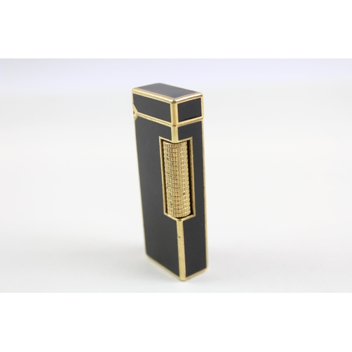 2270 - A Dunhill Rollagas brass and black lacquer pocket lighter