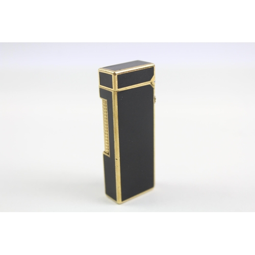 2270 - A Dunhill Rollagas brass and black lacquer pocket lighter