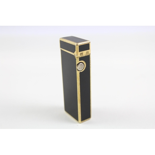 2270 - A Dunhill Rollagas brass and black lacquer pocket lighter