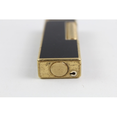 2270 - A Dunhill Rollagas brass and black lacquer pocket lighter