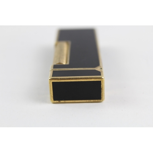 2270 - A Dunhill Rollagas brass and black lacquer pocket lighter