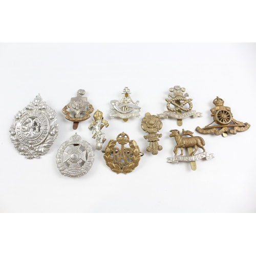 2272 - Ten military cap badges