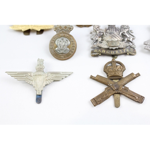 2273 - Ten military cap badges